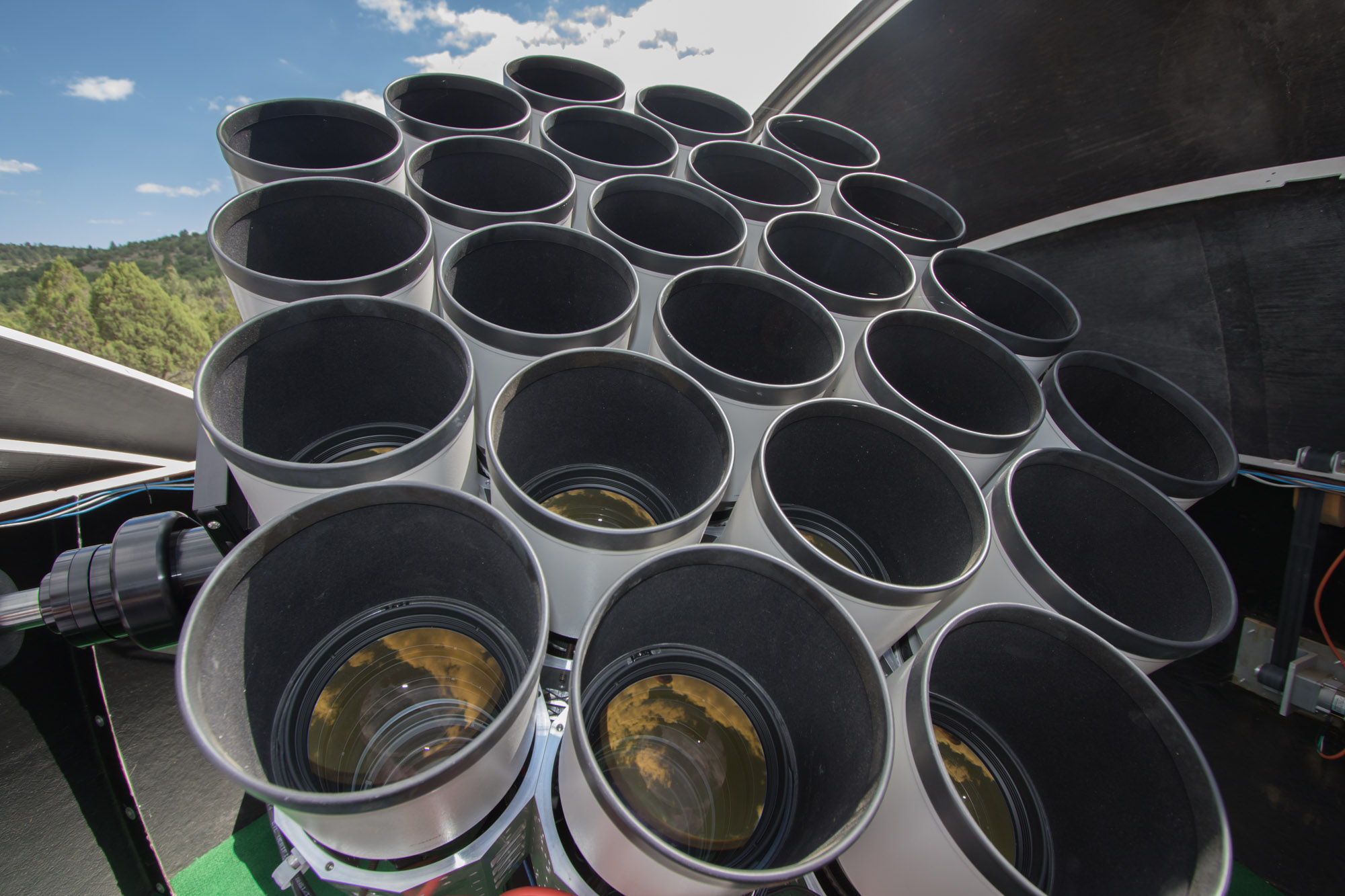 This scope, part of the Dragonfly Telephoto Array, utilizes our dark skies to find low surface brightness objects. Photo courtesy of Pieter van Dokkum. dragonfly